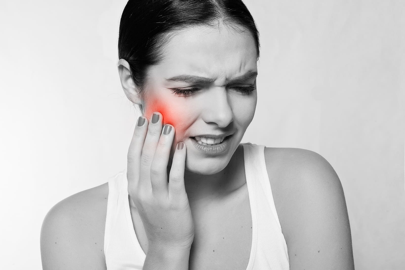 A young lady with severe tooth pain