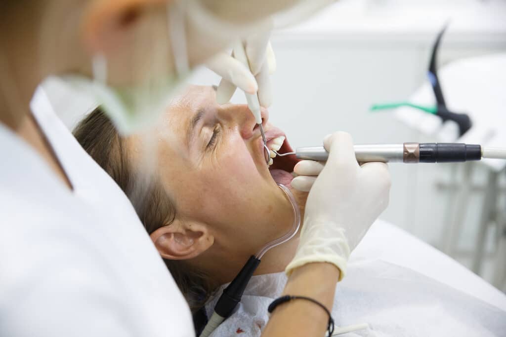 Periodontal Deep Cleaning A dentist performing veneer in Yorktown Heights